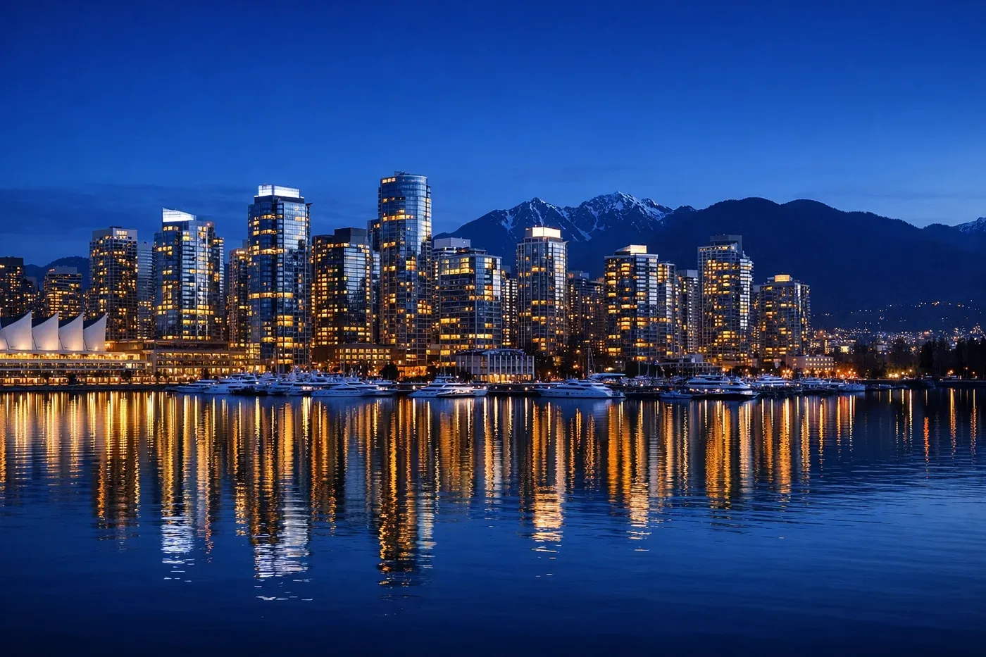Protected high-rise buildings in Vancouver at dusk representing secure property management and leak prevention.